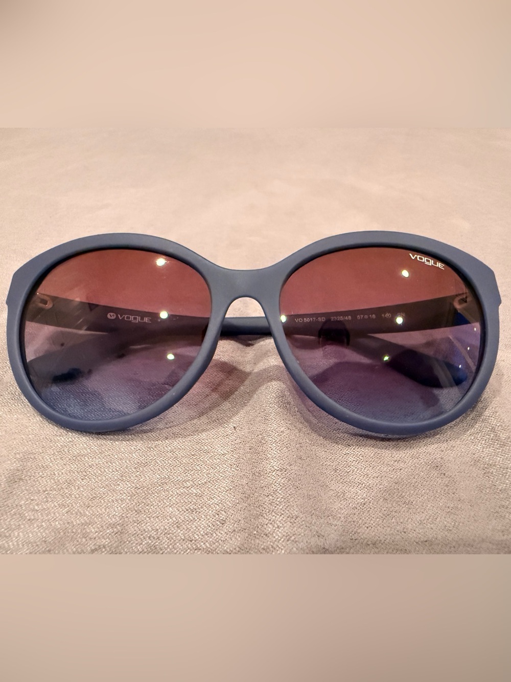 Vogue Women's Matte Blue Frame Sunglasses with Purple-Tinted Lenses
